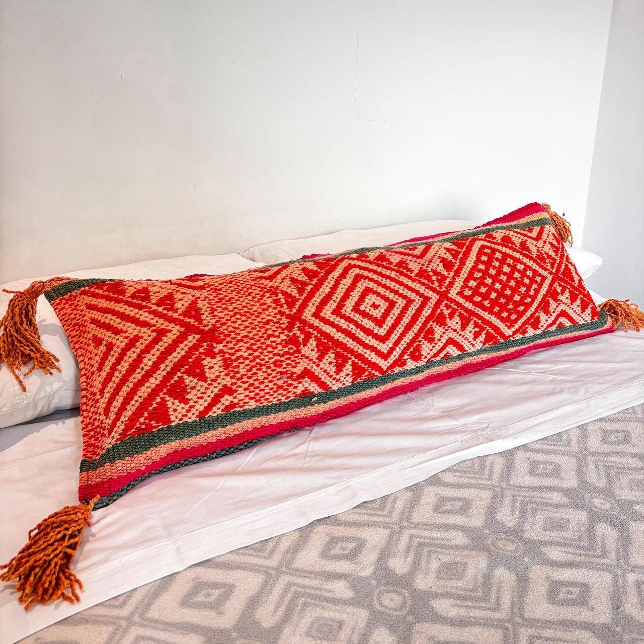 Cojin de cama andino en tonos naranja
